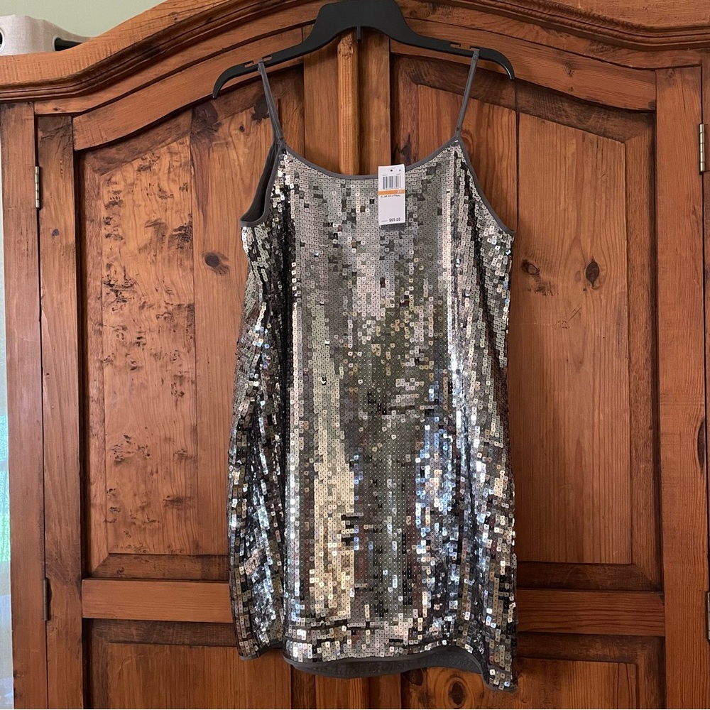Joe Fresh silver sequin blouse.           NWT. Size 3/4